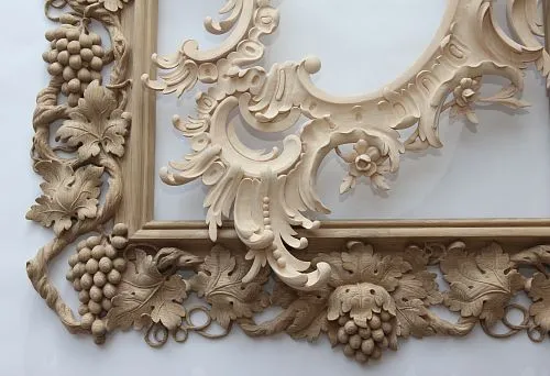 Premium mirror finishing: carved ornament from natural wood