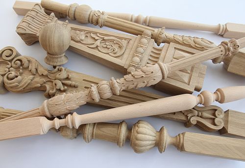 Set of decorative balusters made of oak and beech: carved, turned, and shaped models with ornaments