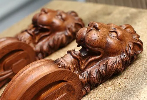 Mudboard detailing: Wood carving as a source of aesthetics.