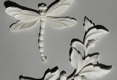 White polyurethane ceiling molding &mdash; relief dragonfly and decorative branch with leaves