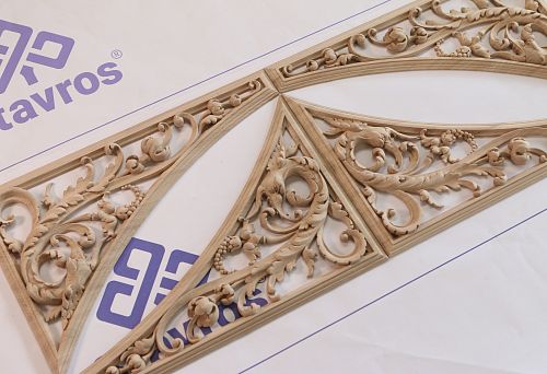 Carved decorative elements from solid wood for internal framing in classic style