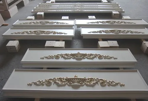 Luxurious Carved Inlays with Gold Leaf &ndash; Elegant Wall Decoration Element in Classic Style.