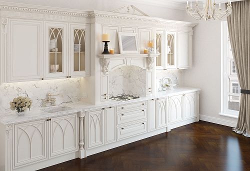 Modern classic kitchen with white facades and marble countertop
