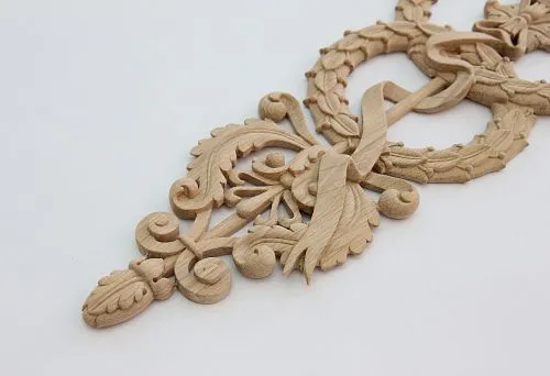 Wooden carved decorative element with classic ornament for window and facade decoration