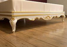 Carved wooden legs for a bed