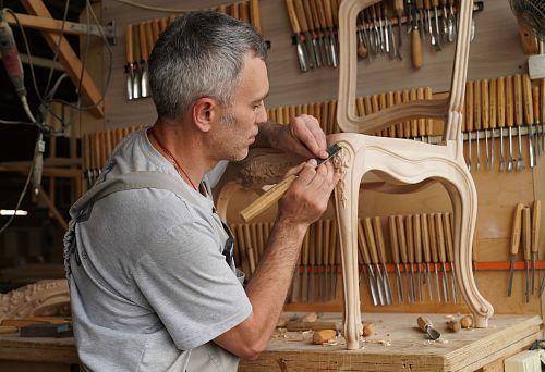 Process of creating an exclusive chair in a workshop with professional tools