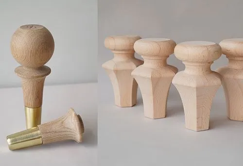 Four wooden legs with carved profile, used in assembling upholstered furniture