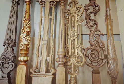 Variety of wooden balusters and support posts with carved decoration and gilding