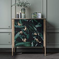 Stylish chest of drawers with polyurethane relief decoration in the form of golden fish.