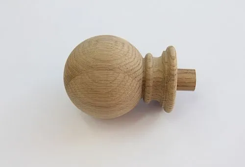 Round wooden furniture handle made of natural oak.