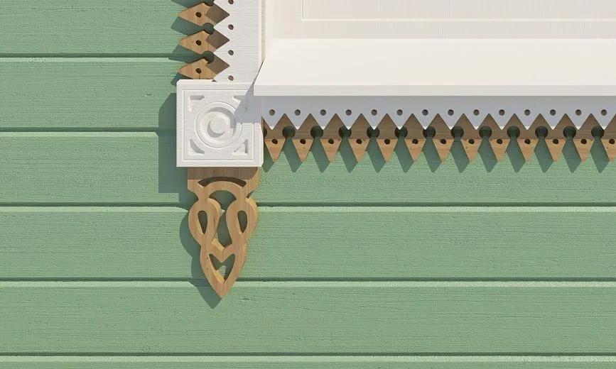 Close-up view of the carved pattern and decorative elements around the window.