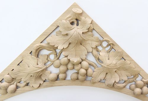 Triangular wooden molding with classic ornament