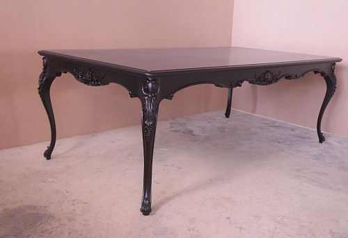 Coffee table made of natural wood, coated with black matte enamel, featuring carved elements and curved legs