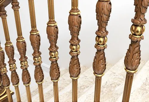 Carved wooden balusters with gold leaf, in classic style