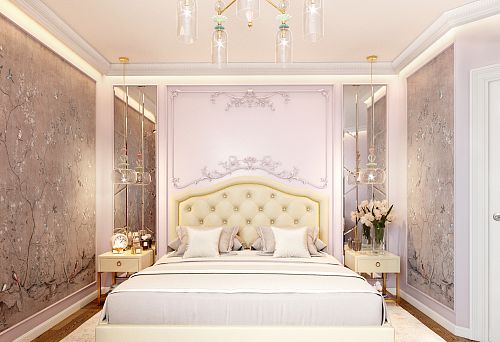 An elegant bedroom with a soft headboard, carved wooden panels, and refined wall decor