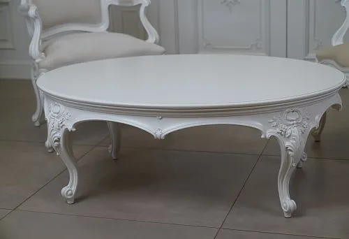 Luxurious carved side table &ndash; an interior decoration for the living room.