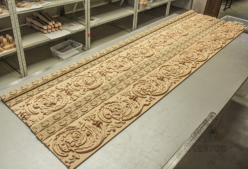 Carved wooden panels with ornament, arranged on a work desk