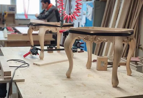 Manufacturing process of stools with carved legs in the carpentry workshop Stavros