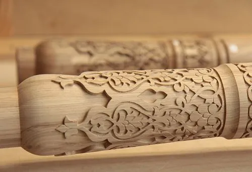 Patterned carving on round wooden blanks