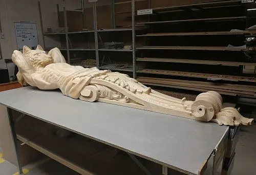 Carved sculptural composition from natural wood, crafted in the workshop.