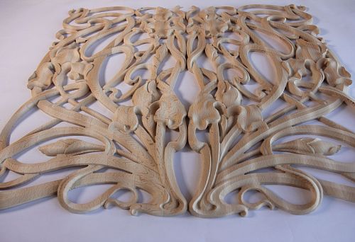 Ornate Wooden Overlay Decor with Flowers and Flowing Lines