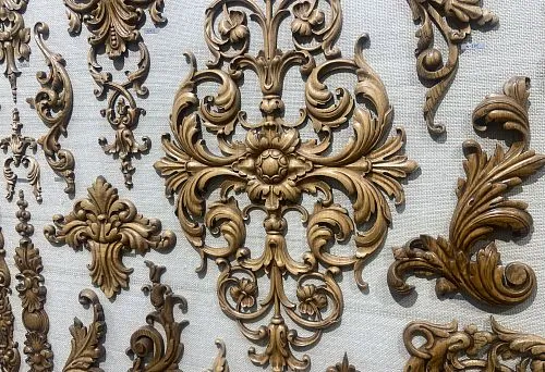 Decorative carved wooden elements for walls for shelf decoration