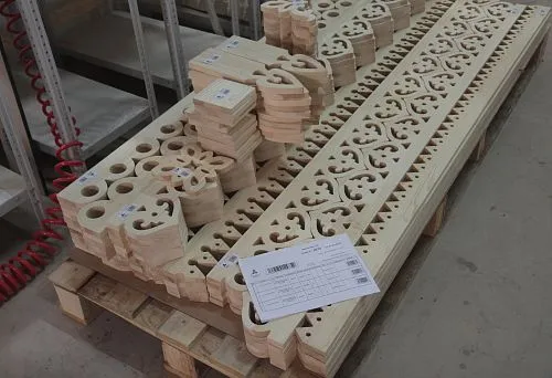 Decorative wooden casing elements with ornamental carving.