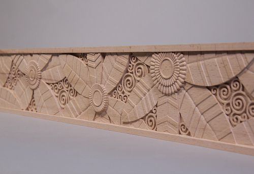 Decorative wooden door casing with carved ornament