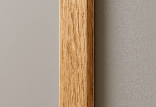 Sanded wooden plank with 20x40 section on a light wall