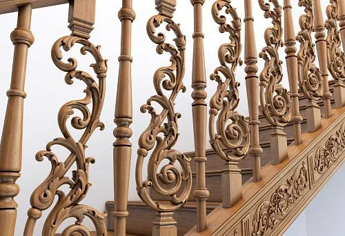Elegant wooden balusters with intricate scrolls, securely fastened to the stair base in a classic style.