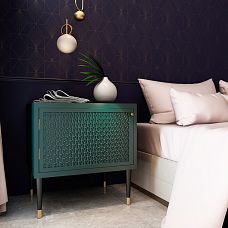 Nightstand with wooden legs MN-148 in the bedroom