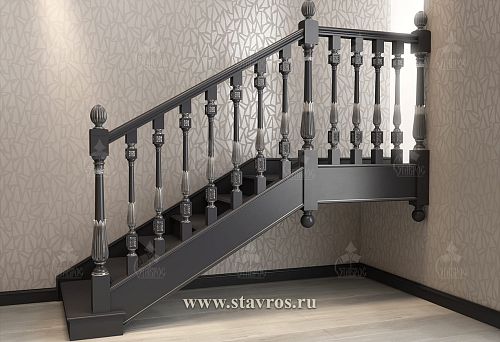Staircase with dark carved balusters in a modern interior