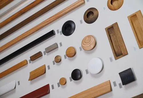 Decorative elements and furniture handles presented on a stylish mood board.
