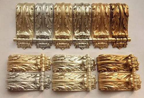 Carved wooden brackets with gold and silver finish