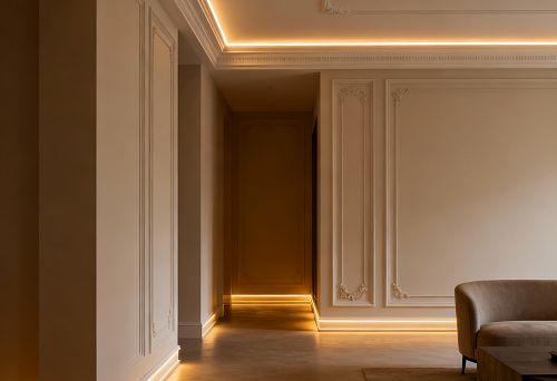 Interior with soft hidden perimeter lighting along the ceiling and floor, built into cornices and baseboards