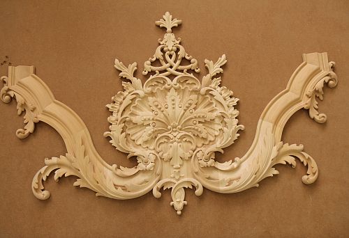 Furniture fragment with rich carved ornament