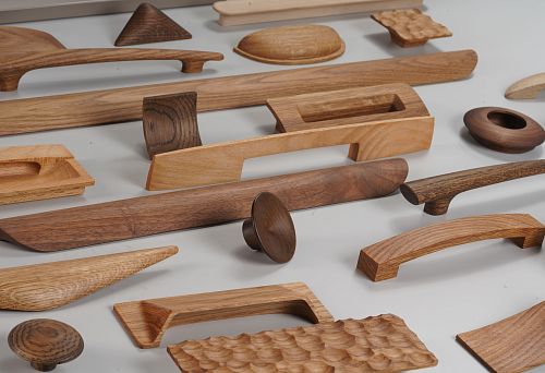 Collection of modern wooden handles in various shapes and shades