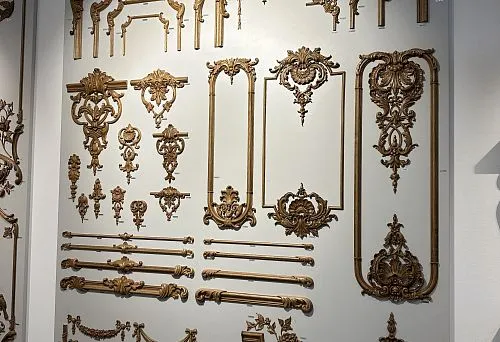 Samples with carved inlays and gold decorative elements.