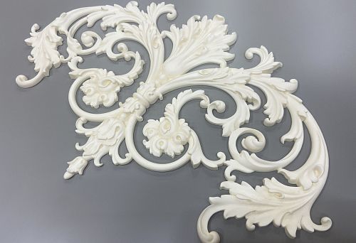 Decorative ceiling molding with elegant floral ornament