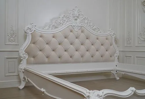 Classic bedroom with furniture in light tones and refined design.