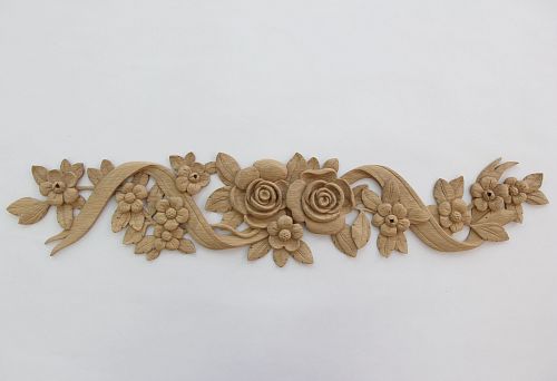Floral carved decor in solid wood &mdash; roses, flowers, and ribbons, original carving for furniture and interior
