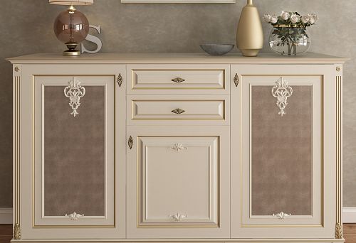 Elegant chest of drawers with decorative appliqu&eacute;s and gold accents in classic style
