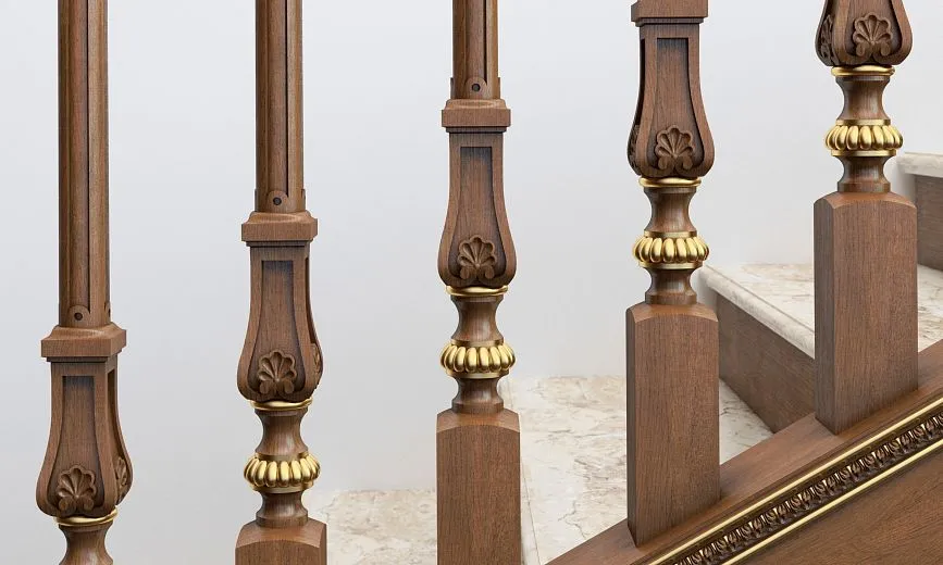 Detail of the balusters and gilded inserts on the staircase railing of project RLE-031