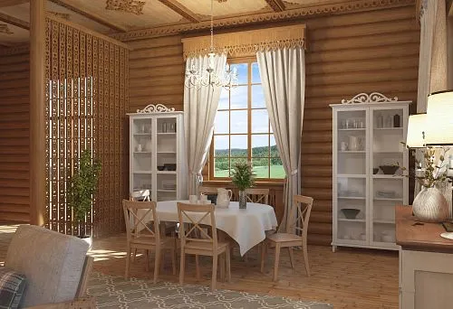 A wooden house with traditional carving, white cabinets, and a dining area.