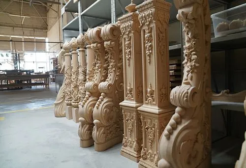 Carved wooden elements in workshop &mdash; the process of creating exclusive decor.