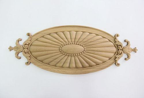Wooden carved decor in classic style, oval rosette with ornament and openwork elements