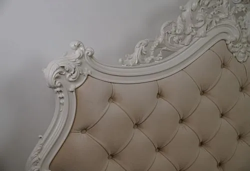 Baroque-style designer furniture with delicate carved patterns
