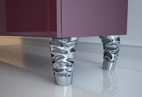 View of carved chest legs with unique design.