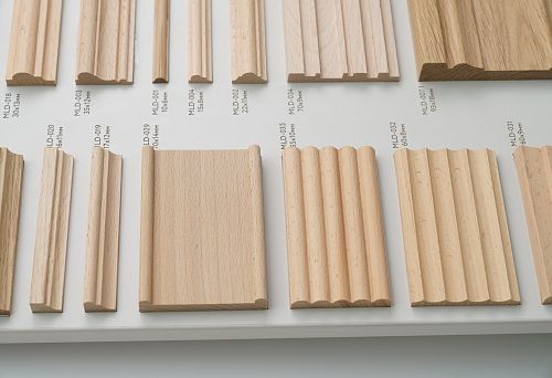 Variety of wooden planks on a display stand for selecting the ideal profile