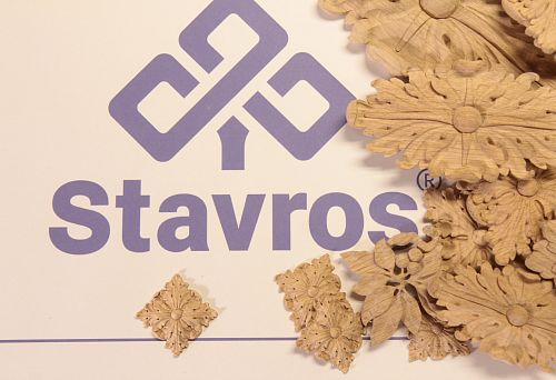 Carved Wooden Decorative Inlays against the STAVROS Logo &mdash; Options for Ceiling Beam and Interior Design